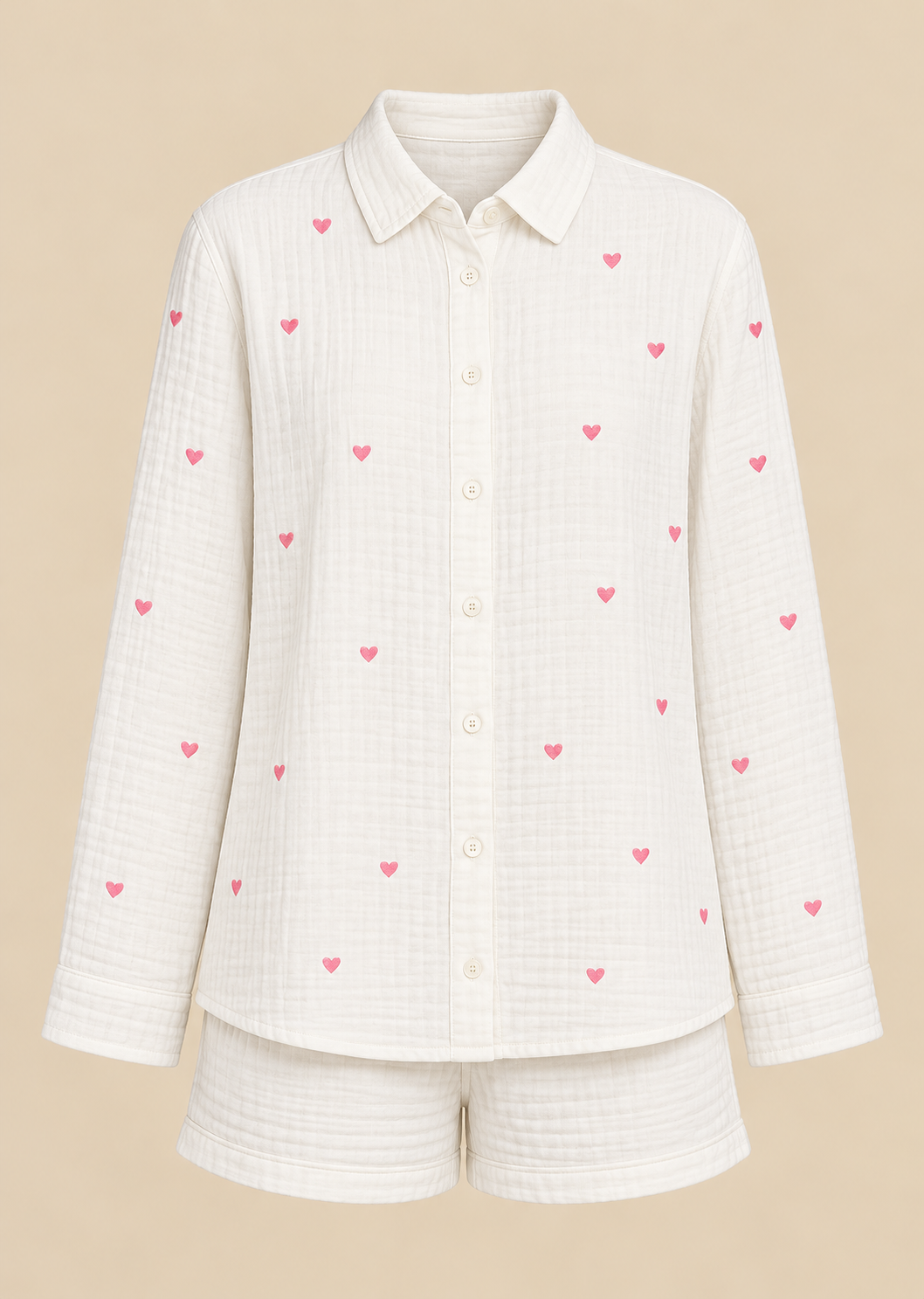 Cream long-sleeve button-down shirt and matching shorts with pink embroidered hearts